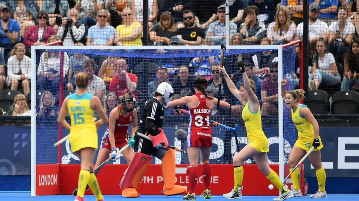 Australia celebrate their opening goal during the Women's FIH Field Hockey Pro League match between Great Britain and Australia at Lee Valley Hockey and Tennis Centre