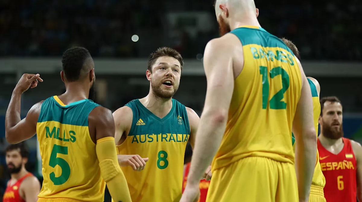 Matthew Dellavedova #8 of Australia talks to his team mates during the Men's Basketball Bronze medal game between Australia and Spain on Day 16 of the Rio 2016 Olympic Games