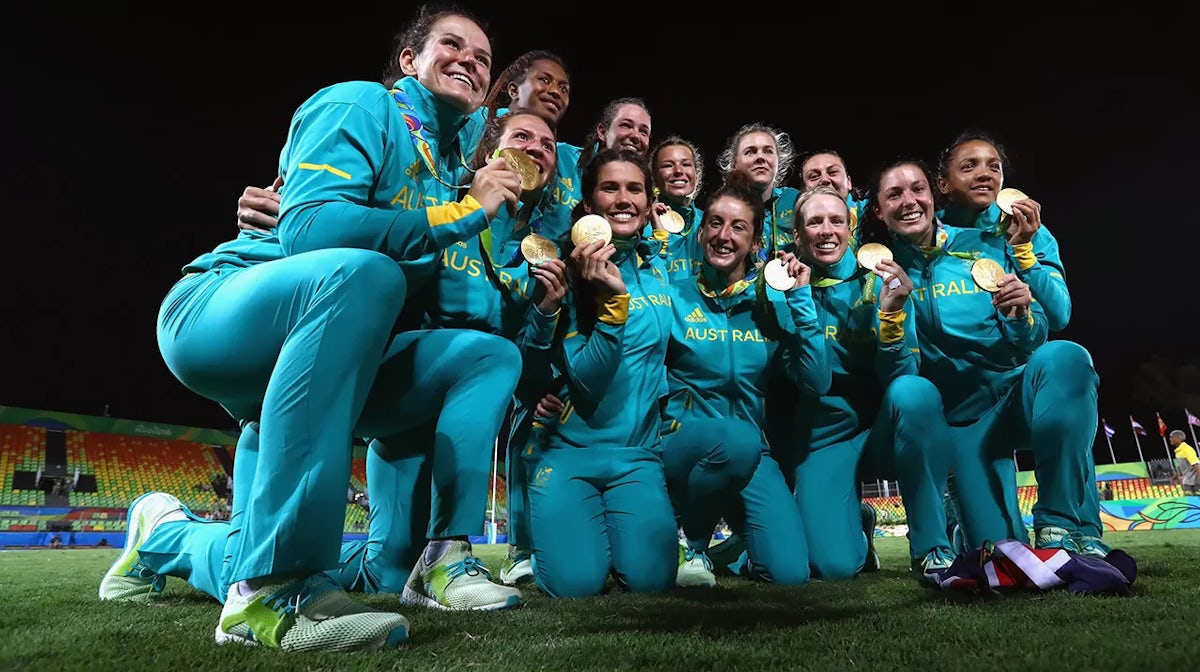 Gold medalist team Australia celebrate after the medal ceremony for the Women's Rugby Sevens on Day 3 of the Rio 2016 Olympic Games at the Deodoro Stadium on August