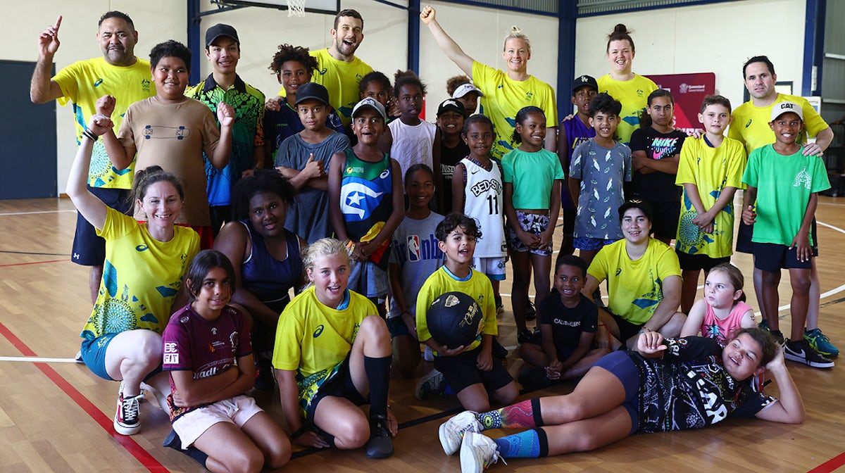Team photograph of of Olympians and participants during a Basketball Clinic at The Torres Shire Sports Complex during the Australian Olympic Committee NAIDOC Week visit on July 04, 2022 in Thursday Island, Australia.