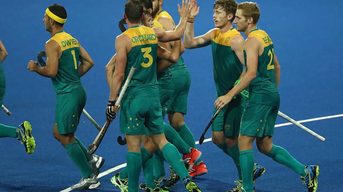 World 's top two to meet in hockey quarters