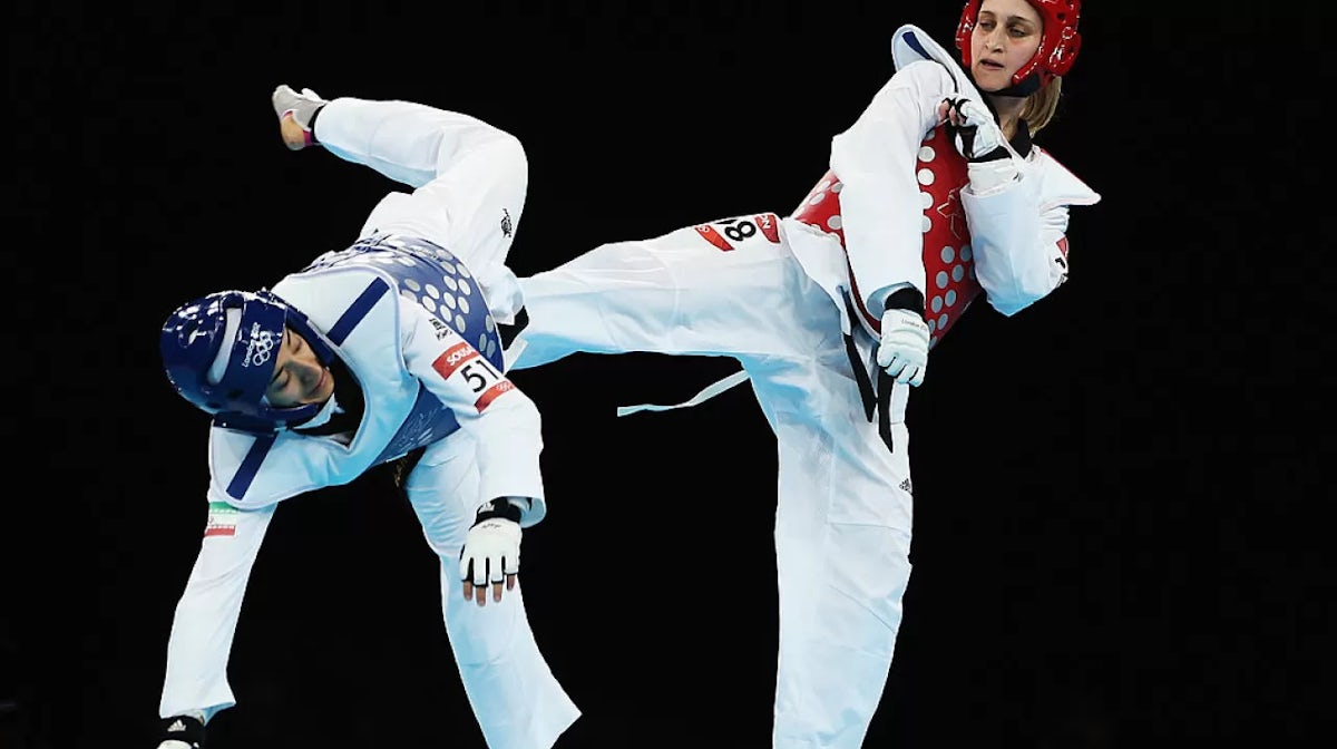 Carmen Marton competes against Sousan Hajipourgoli of Iran during the Women's -67kg Taekwondo Preliminary Round on Day 14 of the London 2012 Olympic Games at ExCeL on August 10, 2012 in London, England.