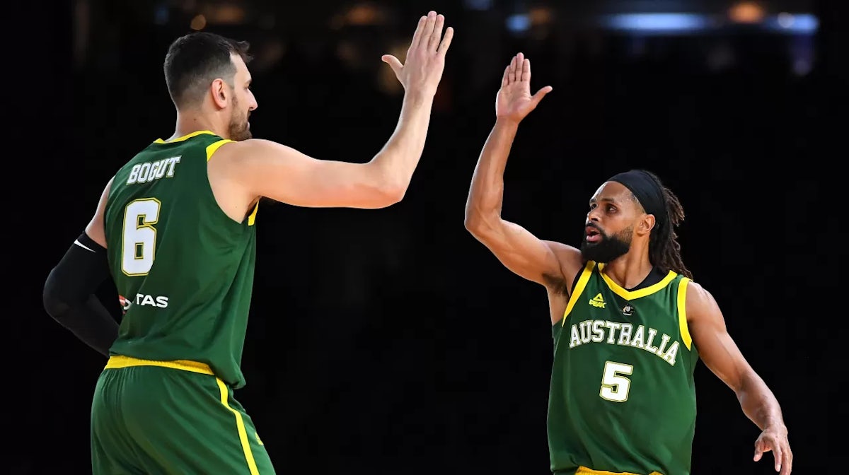 Andrew Bogut and Patrick Mills of the Boomers high five during the International Basketball Friendly match between the Australian Boomers and Team USA - Getty Images