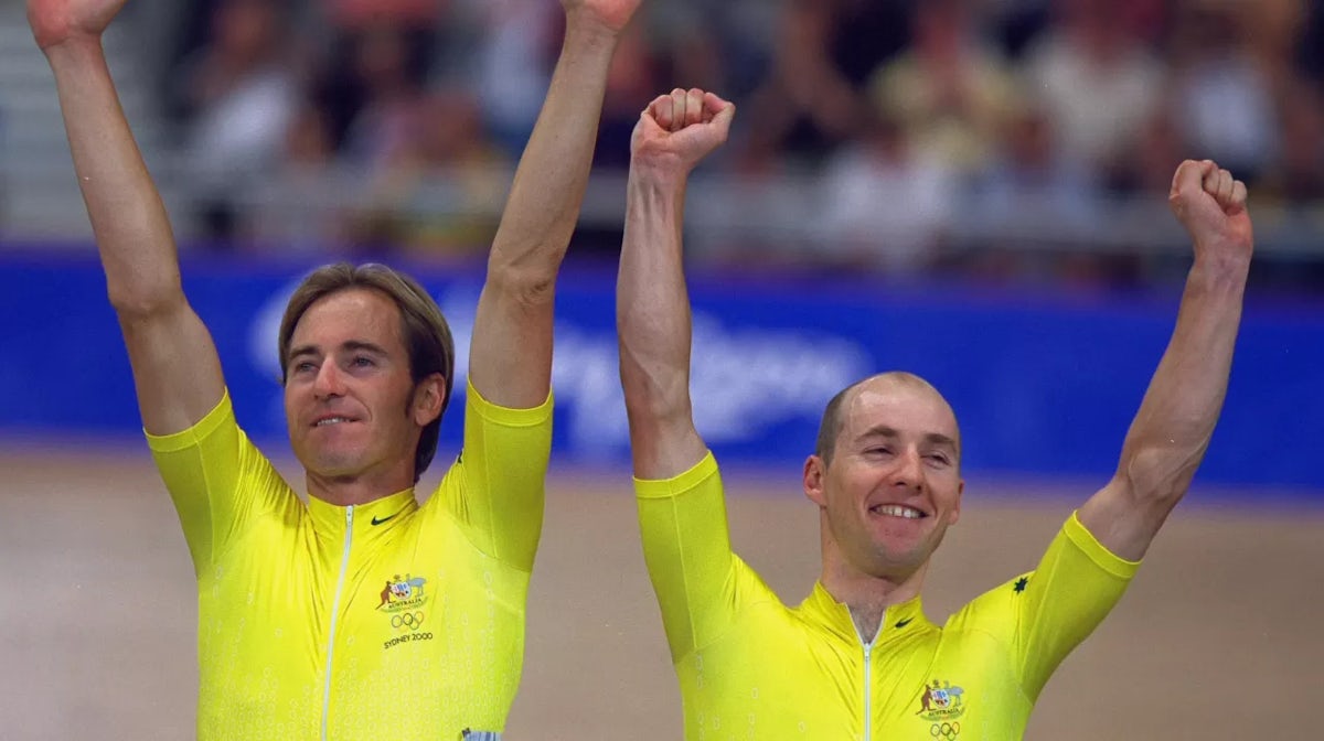 Scott McGrory and Brett Aitken of Australia on the podium after winning the Men's Track Cycling Madison Final at the Dunc Gray Velodrome in Bankstown on Day Six of the Sydney 2000 Olympic Games in Sydney, Australia. \ Mandatory Credit: MikePowell /Allspor