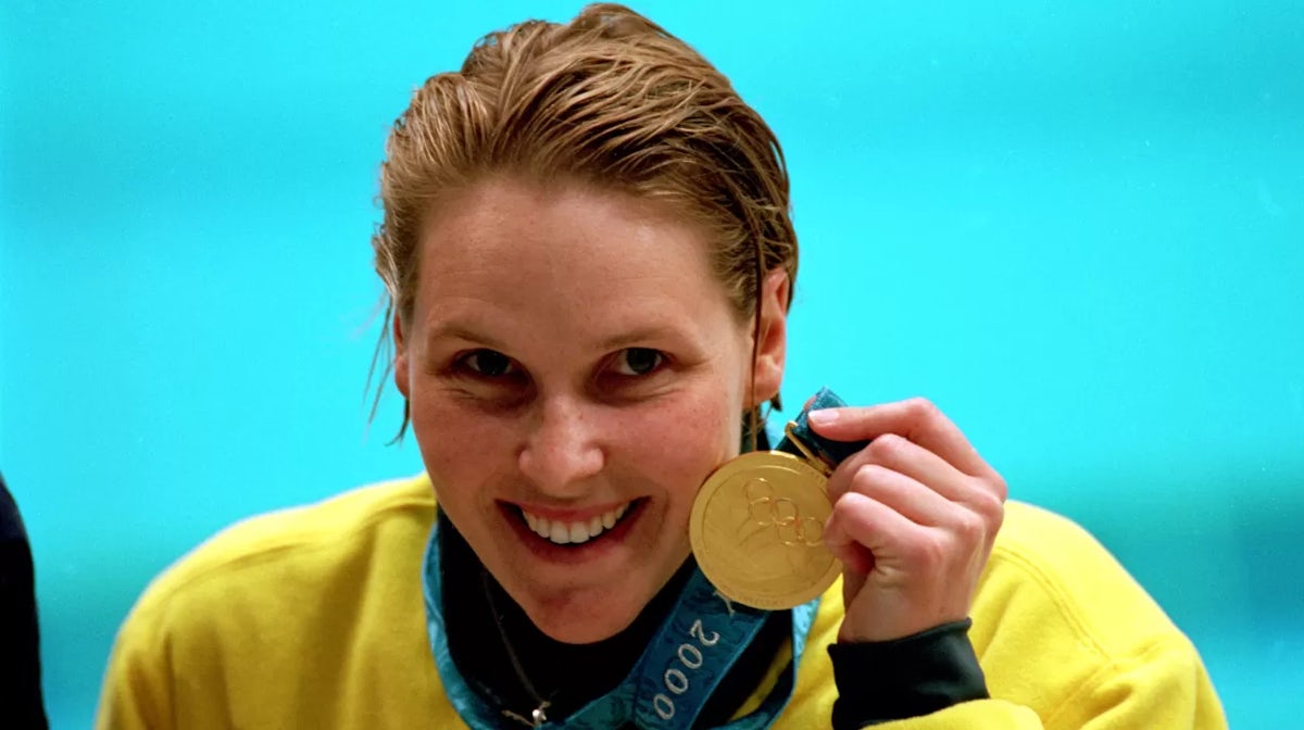 Susie O''Neill of Australia celebrates her gold medal victory in the Women's 200m Freestyle Final held at the Sydney International Aquatic Centre during the Sydney 2000 Olympics, Sydney, Australia. Mandatory Credit: Allsport UK/ALLSPORT