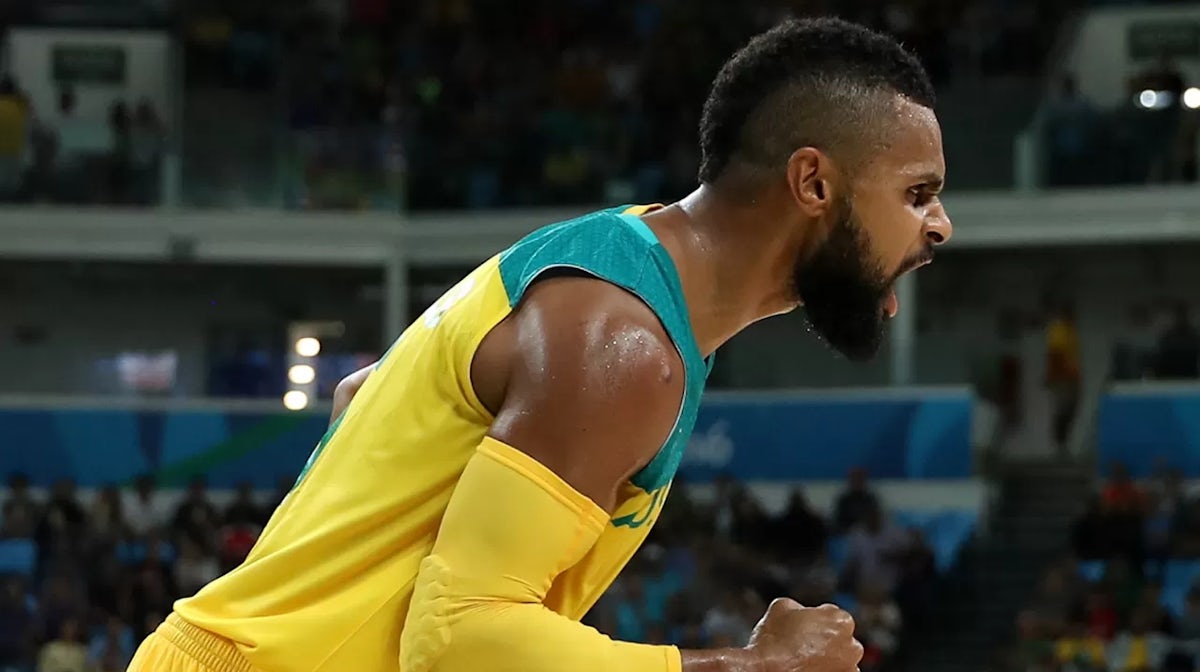 RIO DE JANEIRO, BRAZIL - AUGUST 21: Patty Mills #5 of Australia celebrates a basket during the Men's Basketball Bronze medal game between Australia and Spain on Day 16 of the Rio 2016 Olympic Games at Carioca Arena 1 on August 21, 2016 in Rio de Janeiro, 