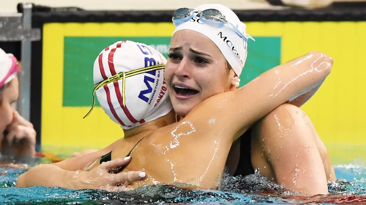 Kaylee McKeown in tears hugs Minna Atherton after breaking the the world record in her Women's 100 Metre Backstroke final during the Australian National Olympic Swimming Trials at SA Aquatic & Leisure Centre on June 13, 2021 in Adelaide, Australia