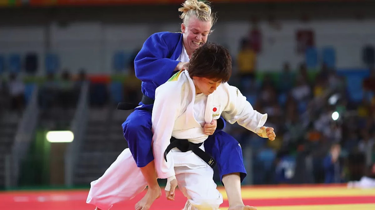 Miku Tashiro of Japan (R) and Katharina Haecker of Australia compete during the Women's -63kg bout on Day 4 of the Rio 2016 Olympic Games at the Carioca Arena 2 on August 9