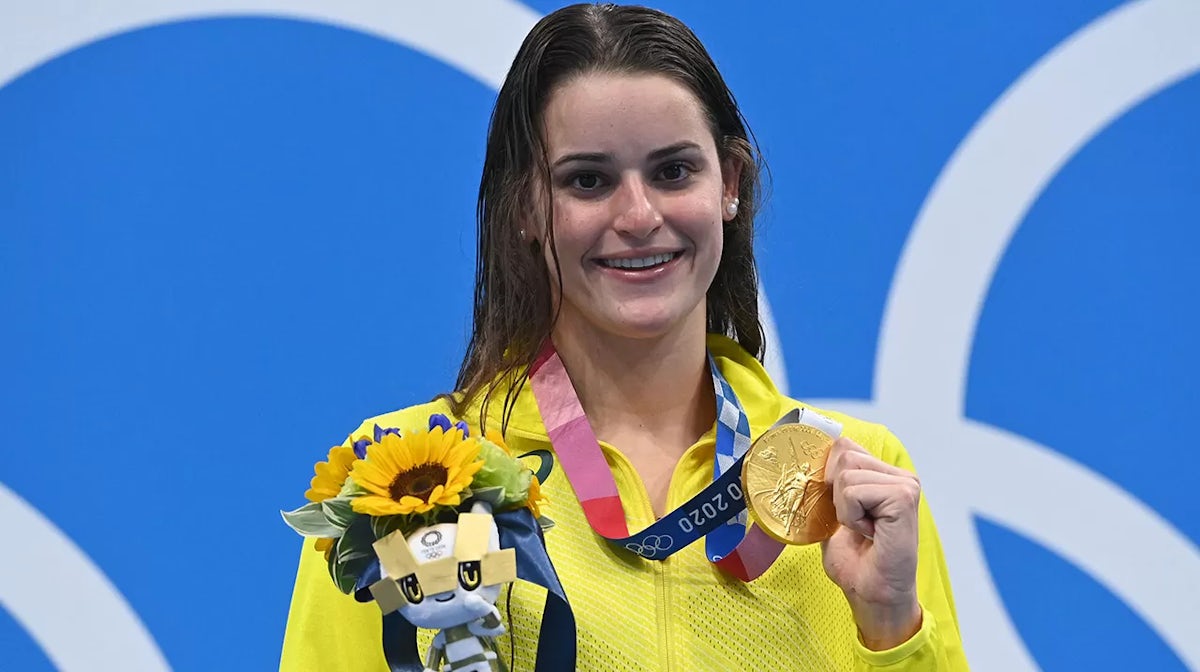 Kaylee McKeown of Team Australia poses with the gold medal after winning the Women's 100m Backstroke Final on day four of the Tokyo 2020 Olympic Games at Tokyo Aquatics Centre on July 27