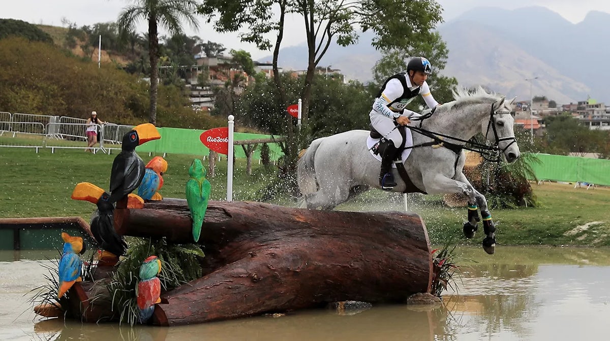 Shane Rose of Australia riding Cp Qualified clears a jump during the Cross Country Eventing on Day 3 of the Rio 2016 Olympic Games at the Olympic Equestrian Centre