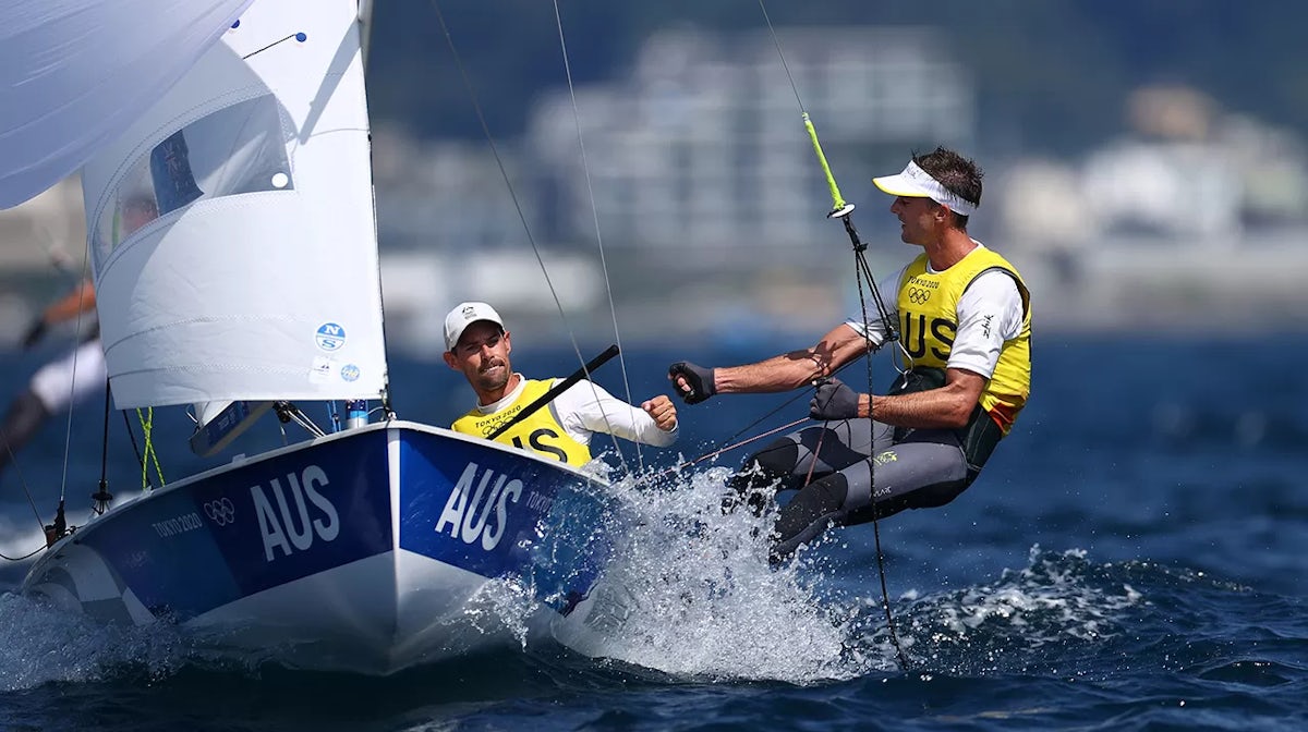 Mathew Belcher and Will Ryan of Team Australia react as they win race 8 as they compete in the Men's 470 class on day nine of the Tokyo 2020 Olympic Games at Enoshima Yacht Harbour on August