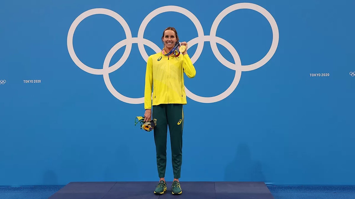 Gold medalist Emma McKeon of Team Australia shows her medal in the podium for Women's 50m Freestyle on day nine of the Tokyo 2020 Olympic Games at Tokyo Aquatics Centre 