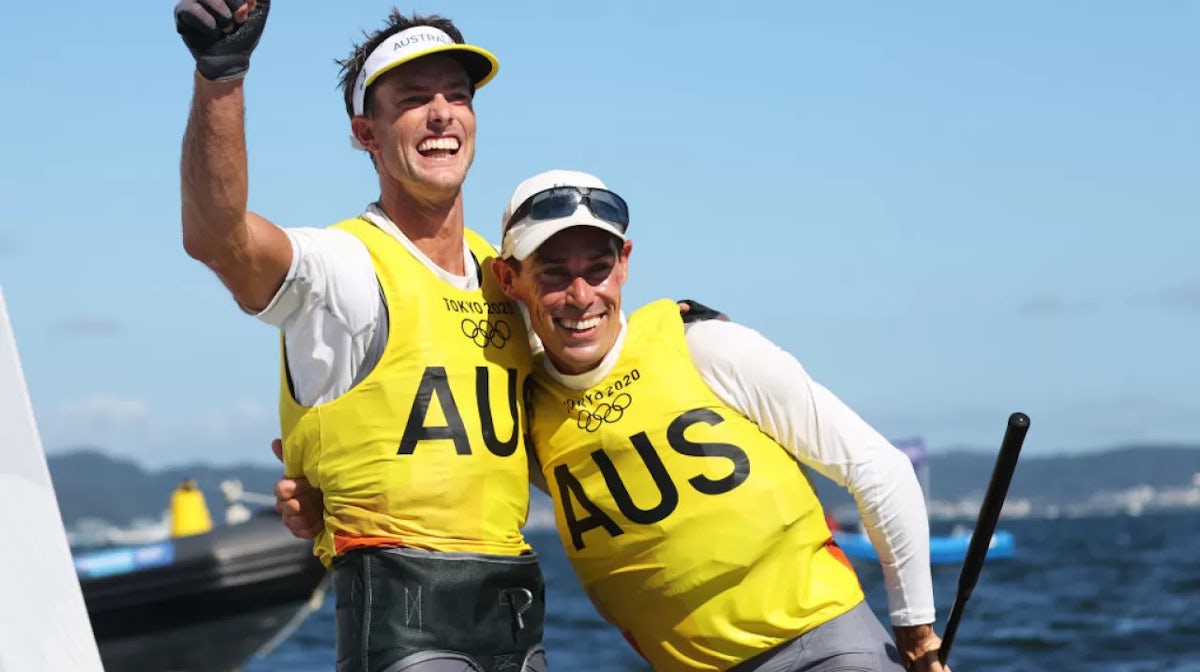 Will Ryan and Mat Belcher celebrate winning the men's 470 sailing at Tokyo 2020