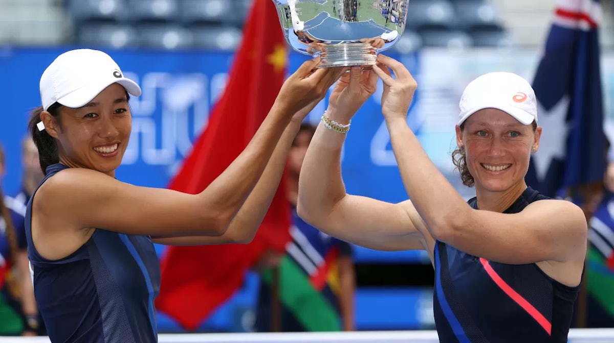 huai Zhang of China and Samantha Stosur of Australia celebrate winning the 2021 US Open Women's Doubles Championship
