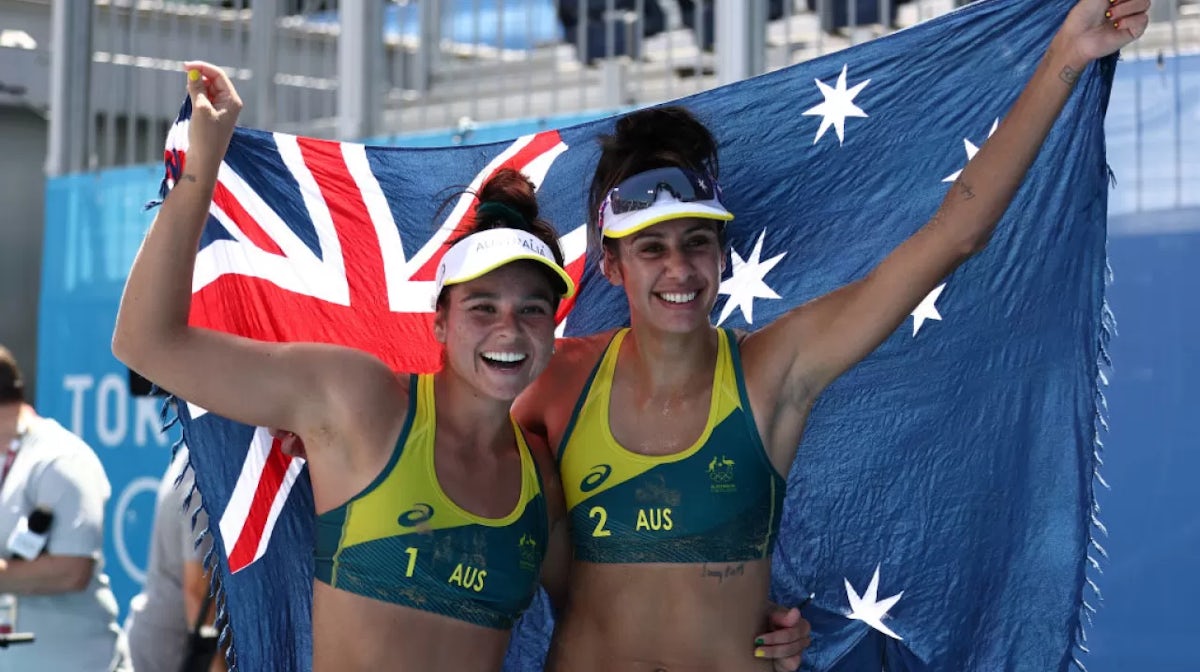 Mariafe Artacho del Solar #1 of Team Australia and Taliqua Clancy #2 celebrate after defeating Team Latvia during the Women's Semifinal beach volleyball on day thirteen of the Tokyo 2020 Olympic Games at Shiokaze Park on August 05