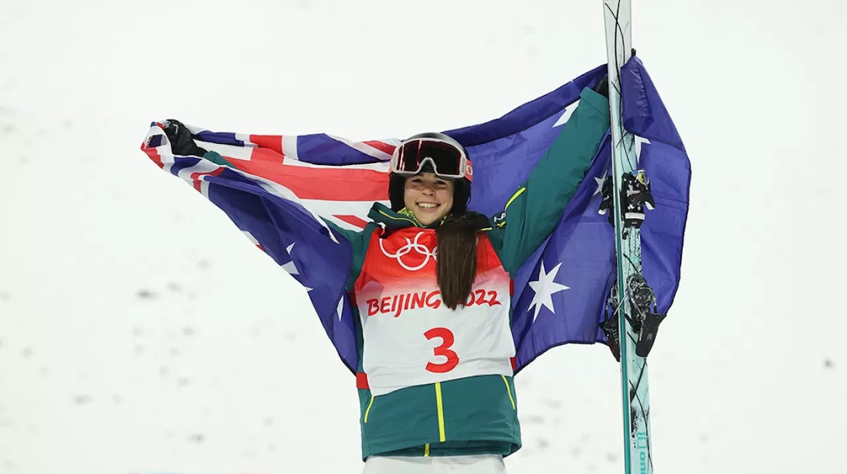 Gold medallist Jakara Anthony of Team Australia celebrates during the Women's Freestyle Skiing Moguls flower ceremony at Genting Snow Park on February 06, 2022 in Zhangjiakou, China.
